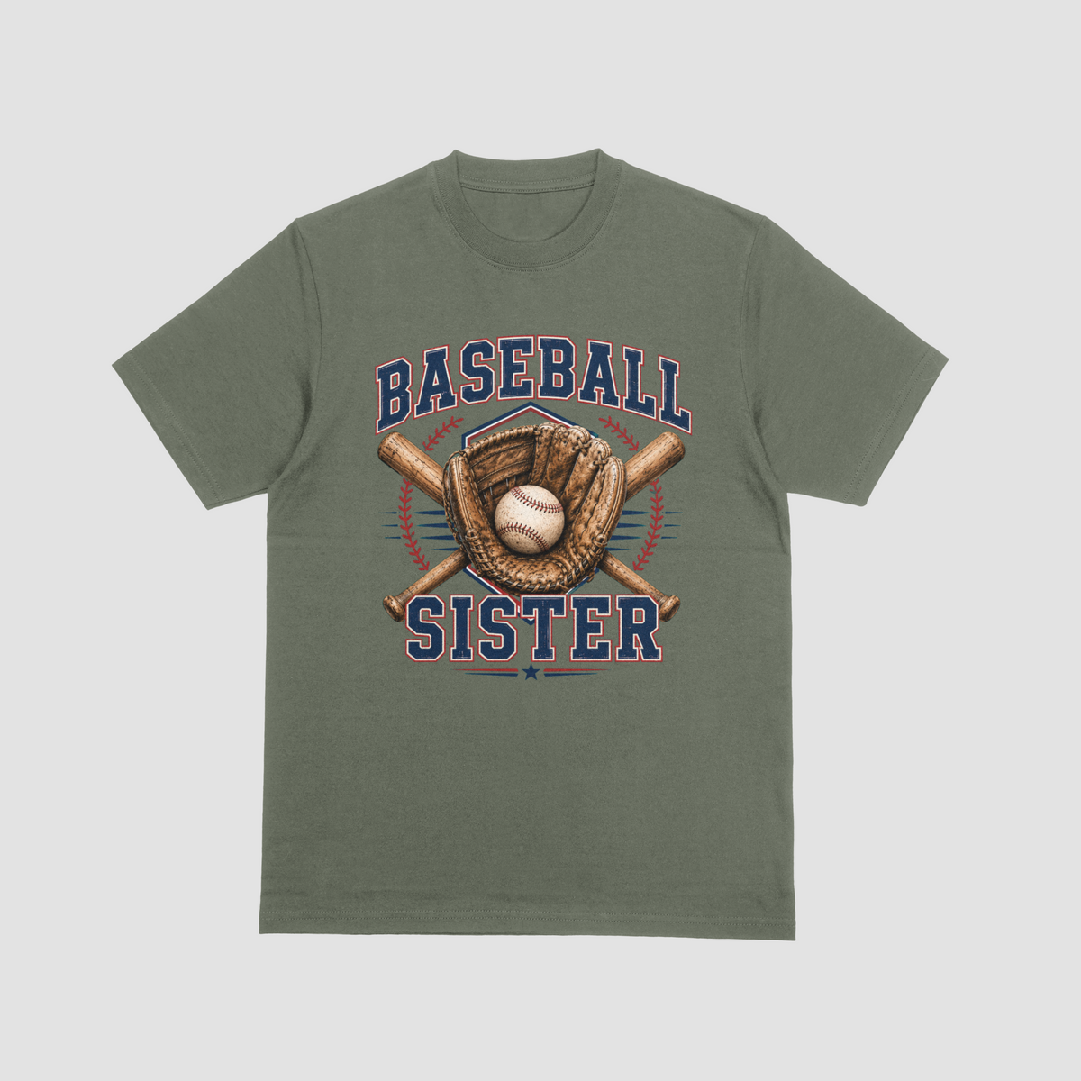 A military green short-sleeve crewneck t-shirt featuring a 'Baseball Sister' graphic on the front. The graphic includes navy blue text, a brown baseball glove, a baseball, and crossed bats, set against a light gray background.