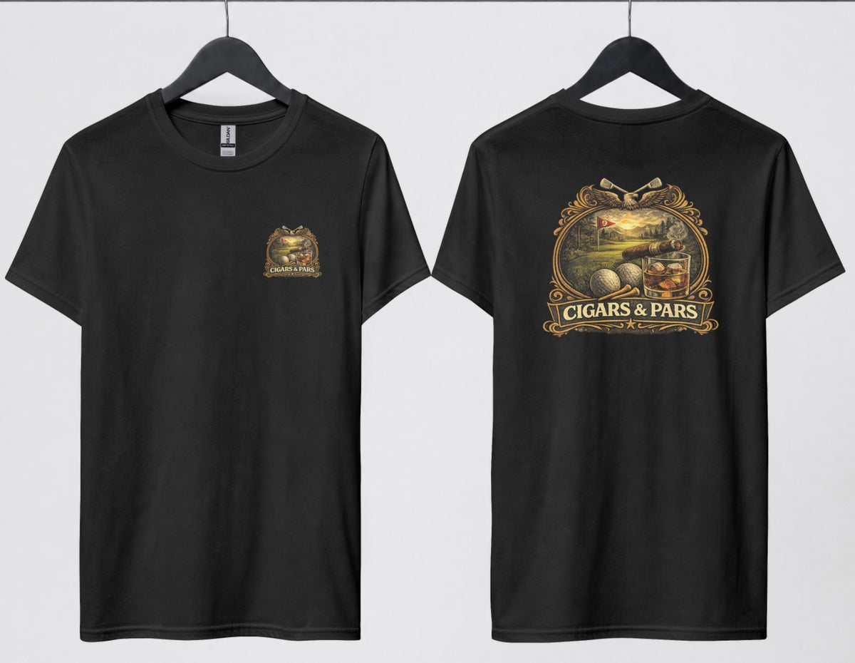 A black t-shirt, front and back views on hangers. Front features a small crest-style graphic on the left chest with a golf course scene, crossed clubs, golf balls, and a cigar, framed above a banner reading 'Cigars & Pars.' Back features the same design enlarged: an eagle with crossed golf clubs above an oval scene of a golf green with a flag reading '9,' bordered below by golf balls, tees, a cigar, and a whiskey glass with ice, all above a decorative banner reading 'Cigars & Pars' with a star."