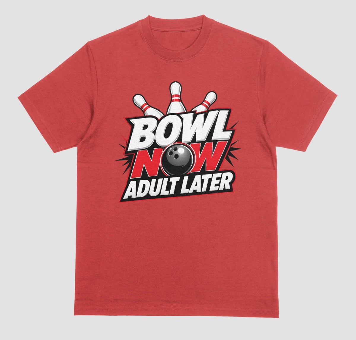 A red crewneck t-shirt featuring a bowling-themed graphic on the chest with the text 'BOWL NOW ADULT LATER' and a bowling ball and pins. | Where We Play Apparel