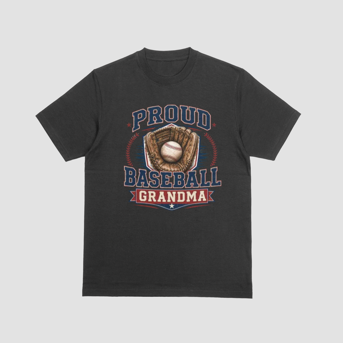 A black short-sleeve crewneck t-shirt with a vintage-style baseball graphic on the front. The graphic features the text 'PROUD BASEBALL GRANDMA' in navy blue and red, surrounding an illustration of a baseball in a brown glove.
