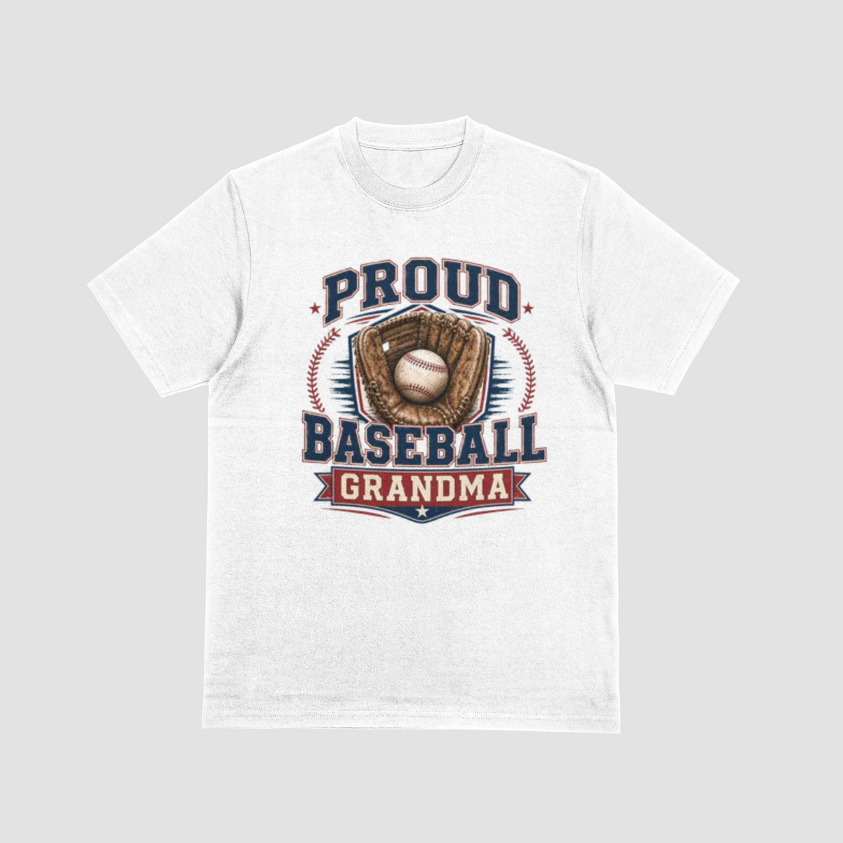 A white short-sleeve crewneck t-shirt with a vintage-style baseball graphic on the front. The graphic features the text 'PROUD BASEBALL GRANDMA' in navy blue and red, surrounding an illustration of a baseball in a brown glove.