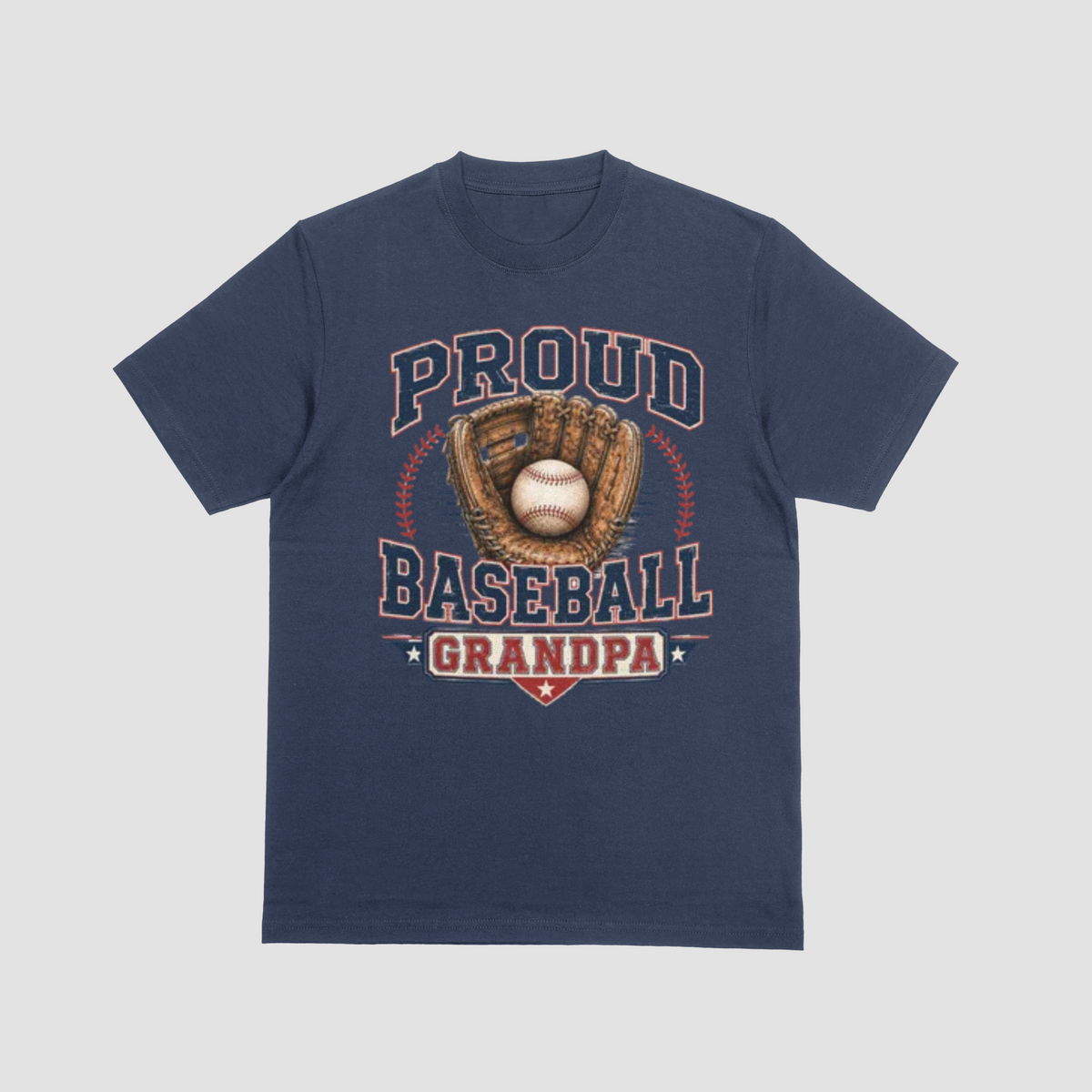 A navy blue short-sleeve crewneck t-shirt featuring a vintage-style baseball graphic on the front. The graphic displays the text 'PROUD BASEBALL GRANDPA' in navy blue and red, surrounding an illustration of a baseball in a brown glove.