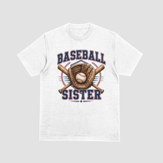 A white short-sleeve crewneck t-shirt featuring a 'Baseball Sister' graphic on the front. The graphic includes navy blue text, a brown baseball glove, a baseball, and crossed bats, set against a light gray background.