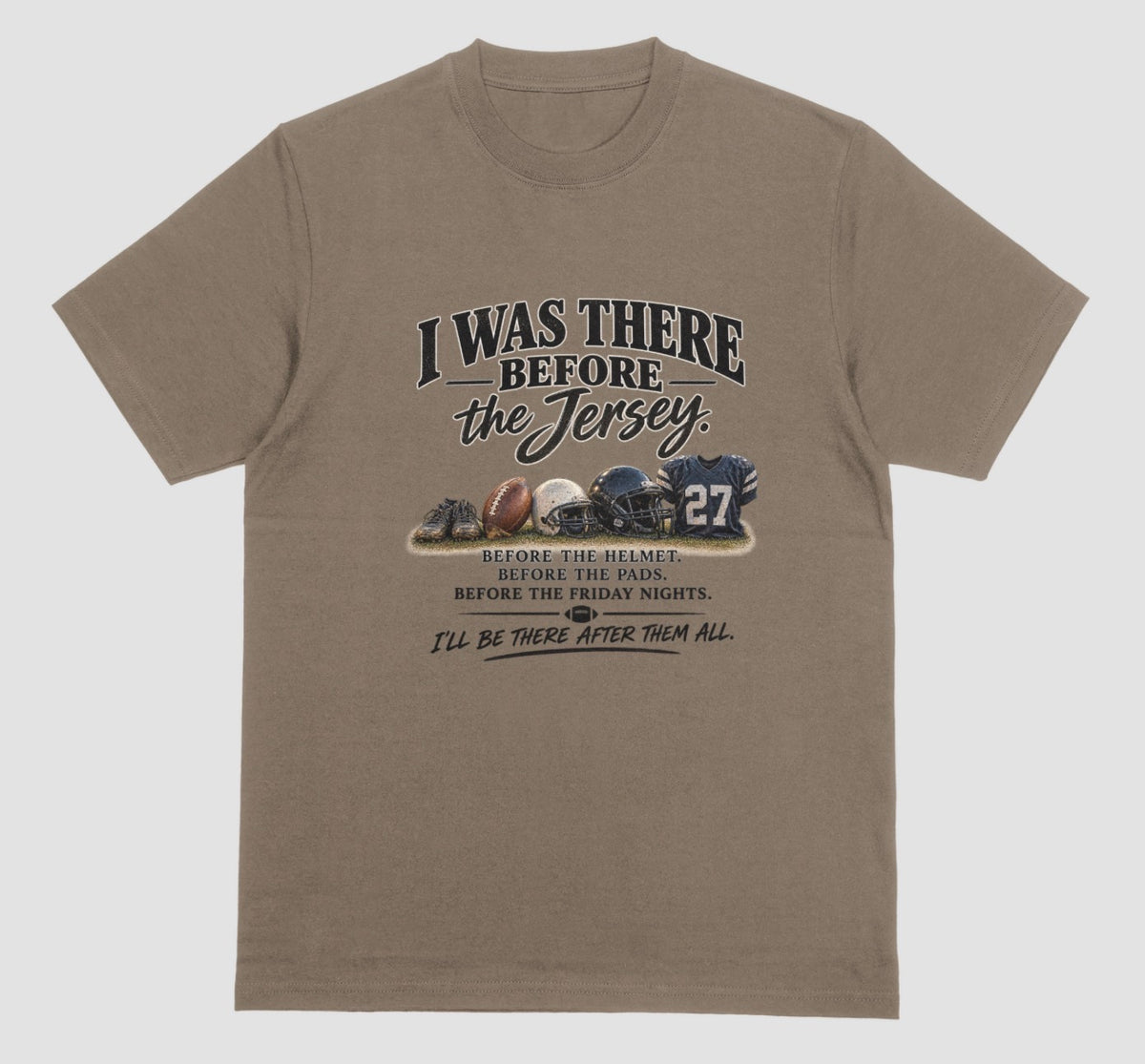 A brown savana short-sleeve t-shirt with a vintage-style football graphic on the chest. The graphic features footballs and a helmet and a jersey with the number 27, accompanied by the text 'I WAS THERE BEFORE the Jersey.