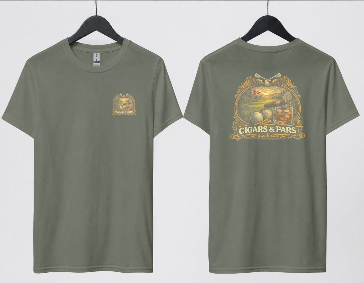 A military green t-shirt, front and back views on hangers. Front features a small crest-style graphic on the left chest with a golf course scene, crossed clubs, golf balls, and a cigar, framed above a banner reading 'Cigars & Pars.' Back features the same design enlarged: an eagle with crossed golf clubs above an oval scene of a golf green with a flag reading '9,' bordered below by golf balls, tees, a cigar, and a whiskey glass with ice, all above a decorative banner reading 'Cigars & Pars' with a star."