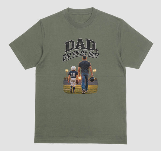 An military green crewneck t-shirt featuring a graphic print on the front. The graphic shows a father and son walking on a football field at night, with the text 'DAD DID YOU SEE THAT?' above them.