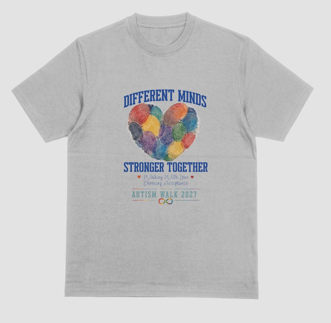 A grey crewneck t-shirt featuring a graphic design for the 'Autism Walk 2027'. The design includes the text 'DIFFERENT MINDS STRONGER TOGETHER' in blue, a heart made of colorful fingerprint patterns in the center, and the 'Autism Walk 2027' logo at the bottom.