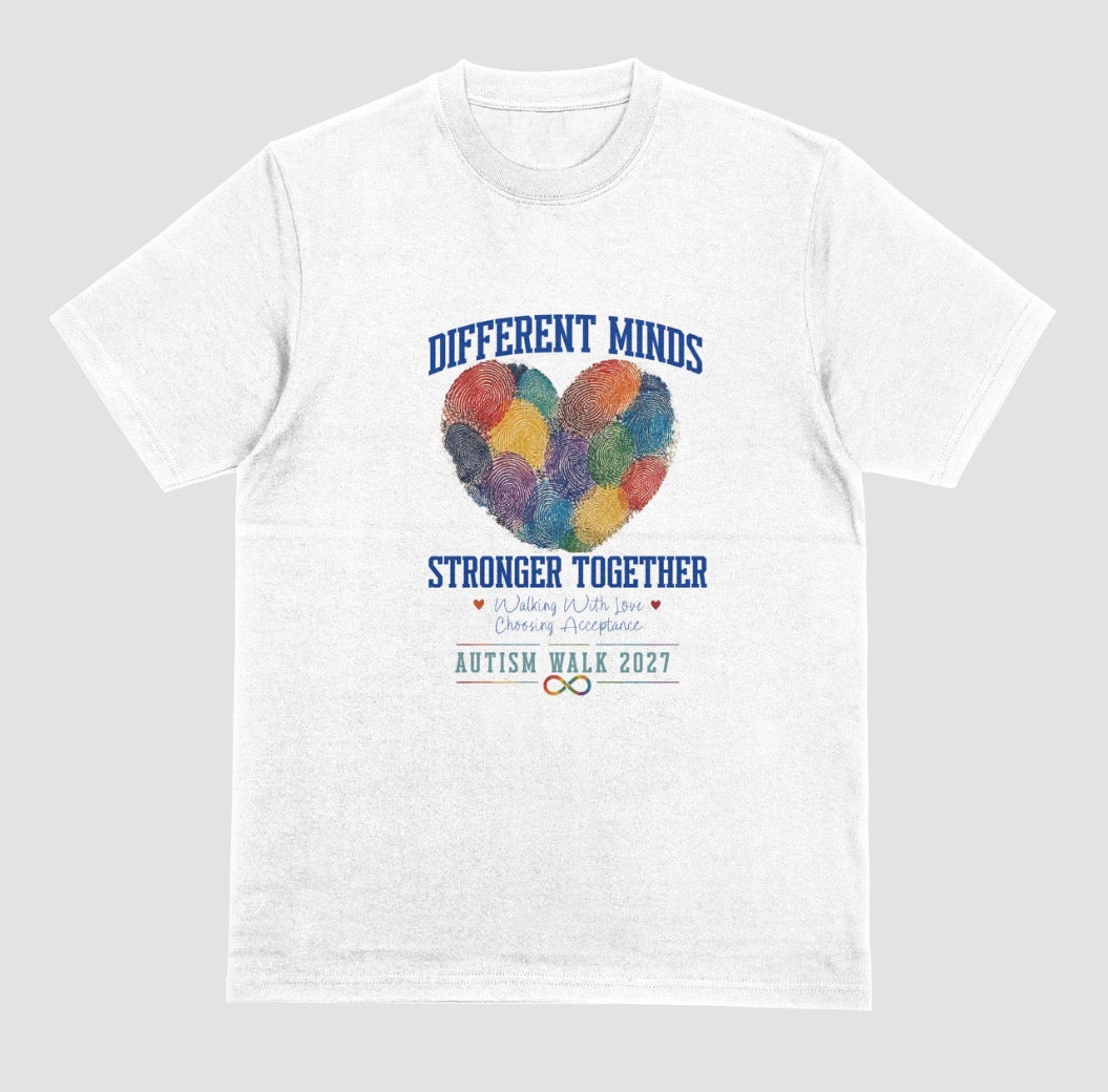 A white crewneck t-shirt featuring a graphic design for the 'Autism Walk 2027'. The design includes the text 'DIFFERENT MINDS STRONGER TOGETHER' in blue, a heart made of colorful fingerprint patterns in the center, and the 'Autism Walk 2027' logo at the bottom.