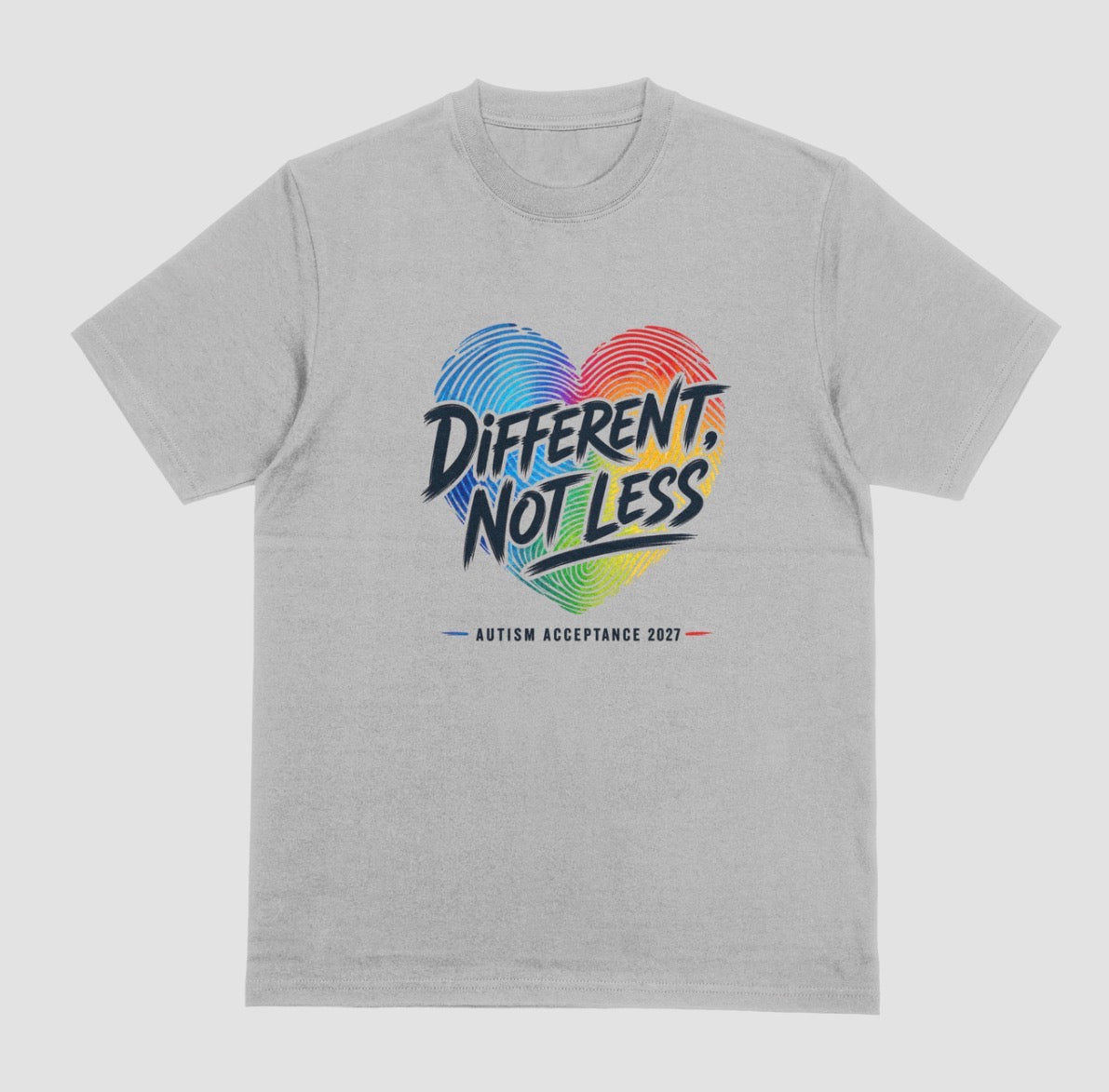 A grey crewneck t-shirt featuring a colorful graphic on the chest. The graphic shows a heart made of blue and red fingerprint patterns with the text 'DIFFERENT, NOT LESS' in black and blue, and 'AUTISM ACCEPTANCE 2021' printed below in small black letters with red and blue accents.