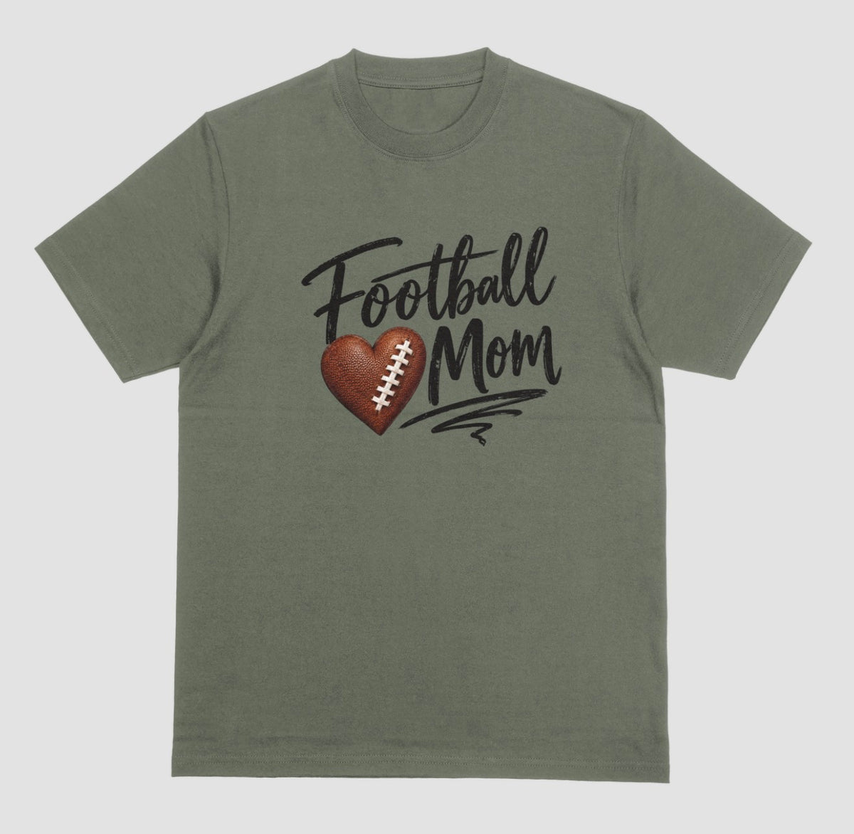 A military green crewneck T-shirt featuring 'Football Mom' text in black script lettering, with a football-textured heart design between the words