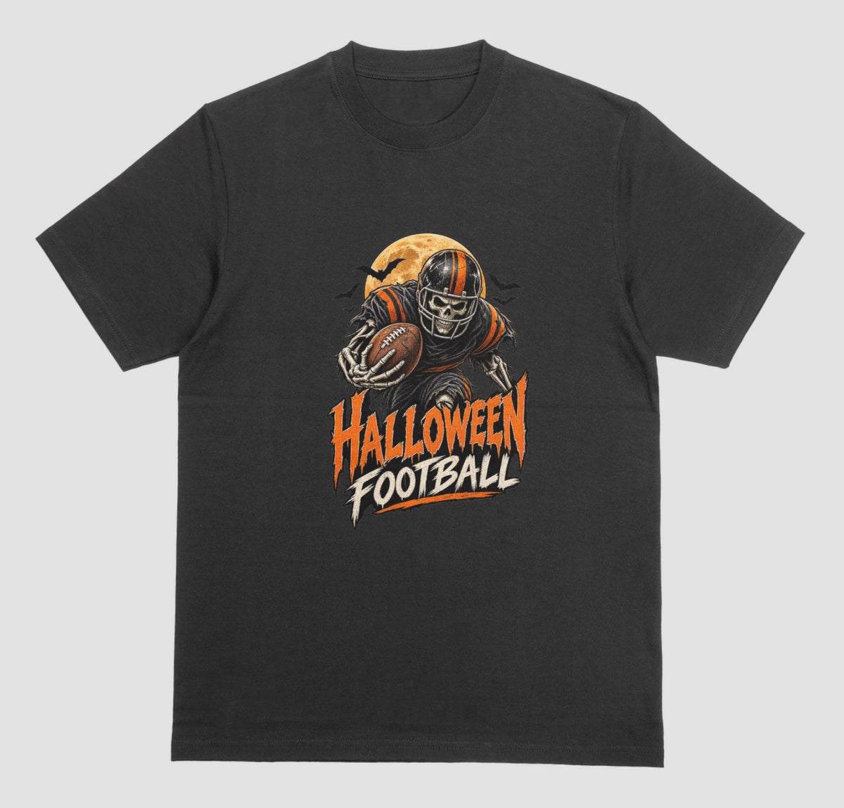 A Black t-shirt reading "Halloween Football" in orange and cream lettering, with a skeleton football player in a striped helmet carrying a football in front of a full moon and bats