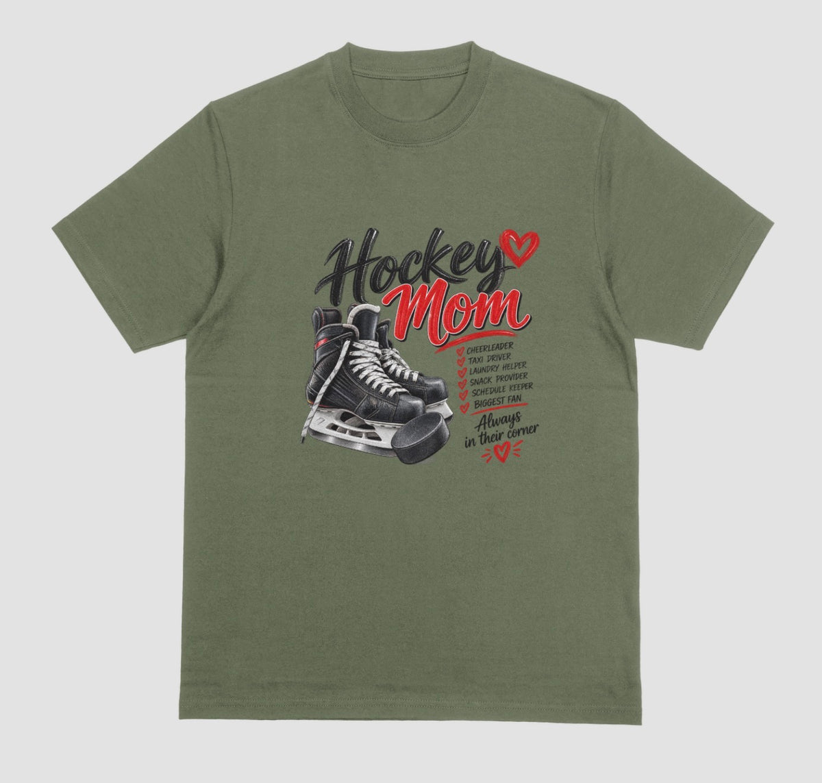 A military green "Hockey Mom" t-shirt with black hockey skates, puck, and red heart design listing cheerleader, taxi driver, and biggest fan, with the tagline "Always in their corner"