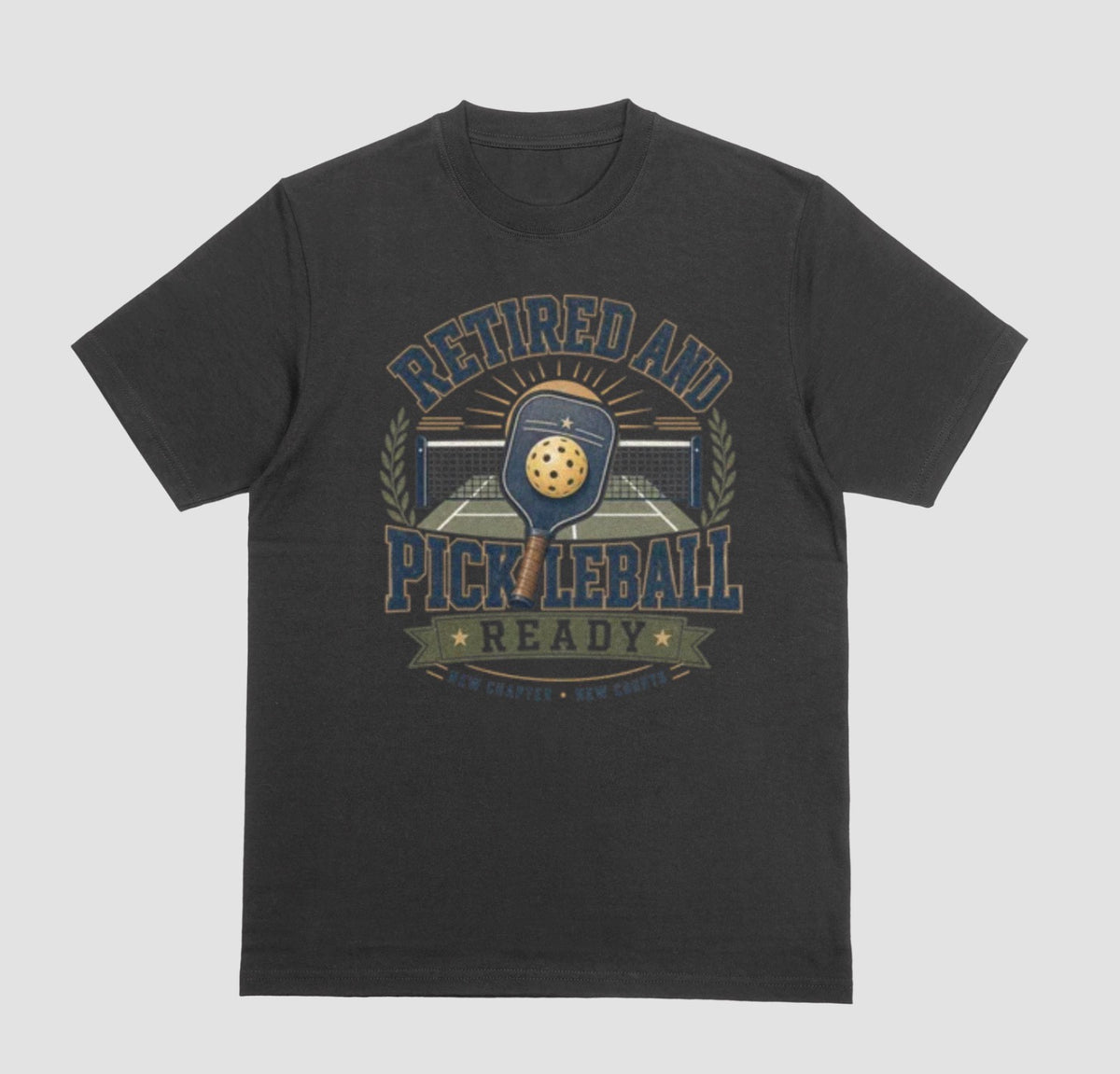 A black crewneck t-shirt with the saying 'RETIRED AND PICKLEBALL READY' with a pickleball and paddle displayed with a vintage style.