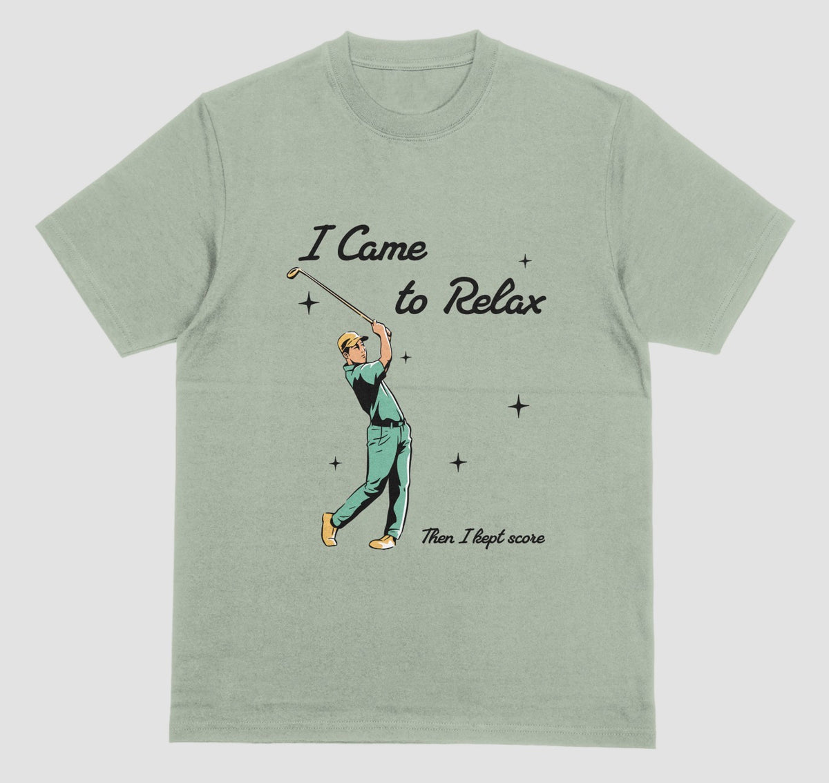 A sage green crewneck t-shirt featuring a retro-style graphic of a golfer mid-swing with the text 'I Came to Relax' and 'Then, I kept score'.