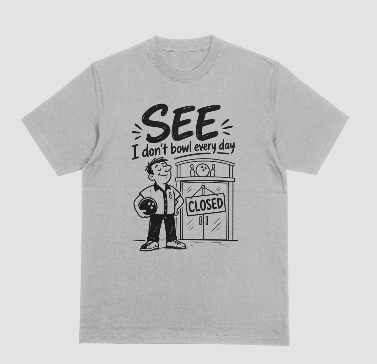  light grey short-sleeve t-shirt with a graphic print on the front. The graphic features a cartoon bowling player holding a bowling ball next to a bowling alley door with a 'CLOSED' sign, with the text 'SEE I don't bowl every day' above.