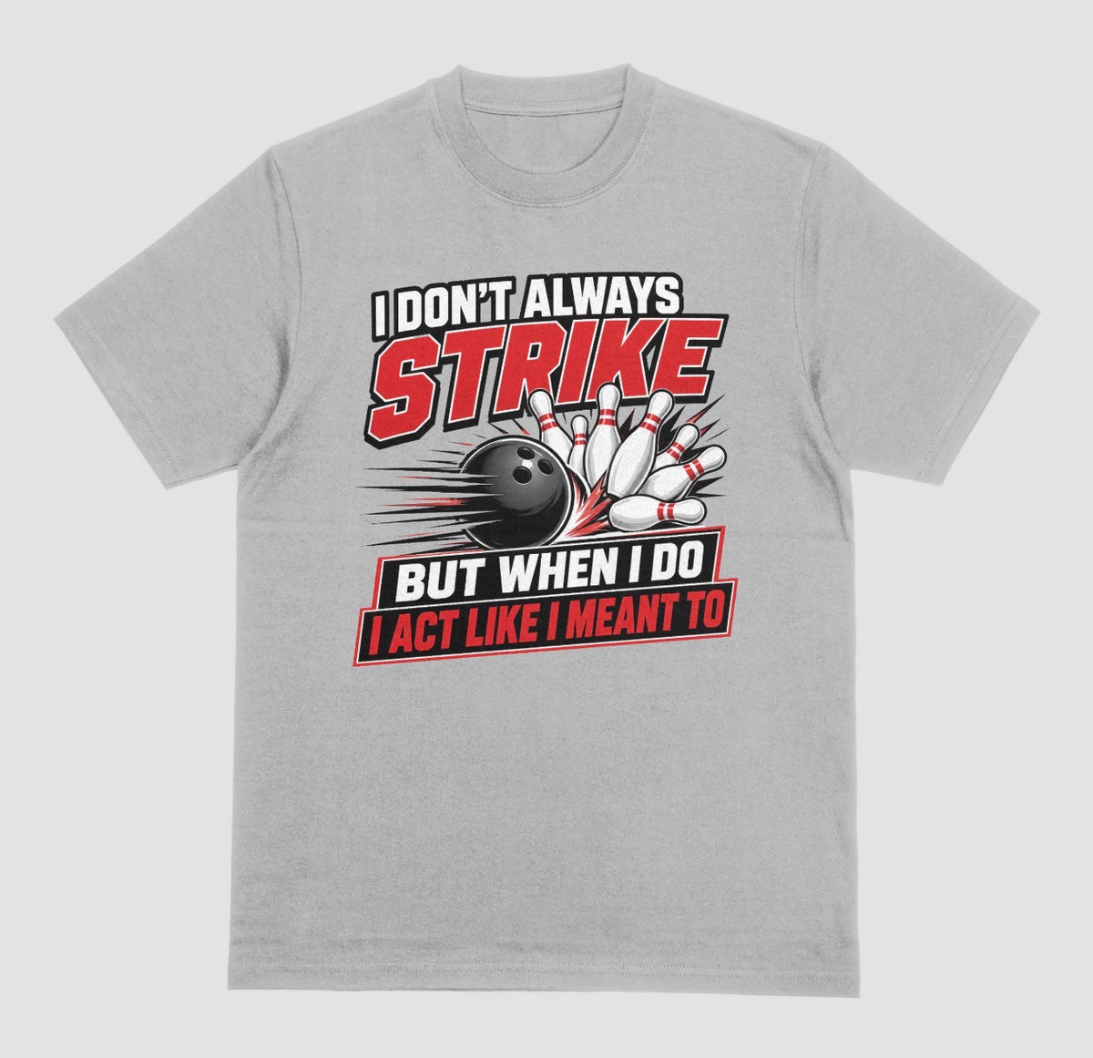 A light gray short-sleeve t-shirt with a bowling-themed graphic on the front. The graphic features the text 'I DON'T ALWAYS STRIKE BUT WHEN I DO I ACT LIKE I MEANT TO' in white and red lettering, surrounding an illustration of a black bowling ball and white bowling pins. | Where We Play Apparel