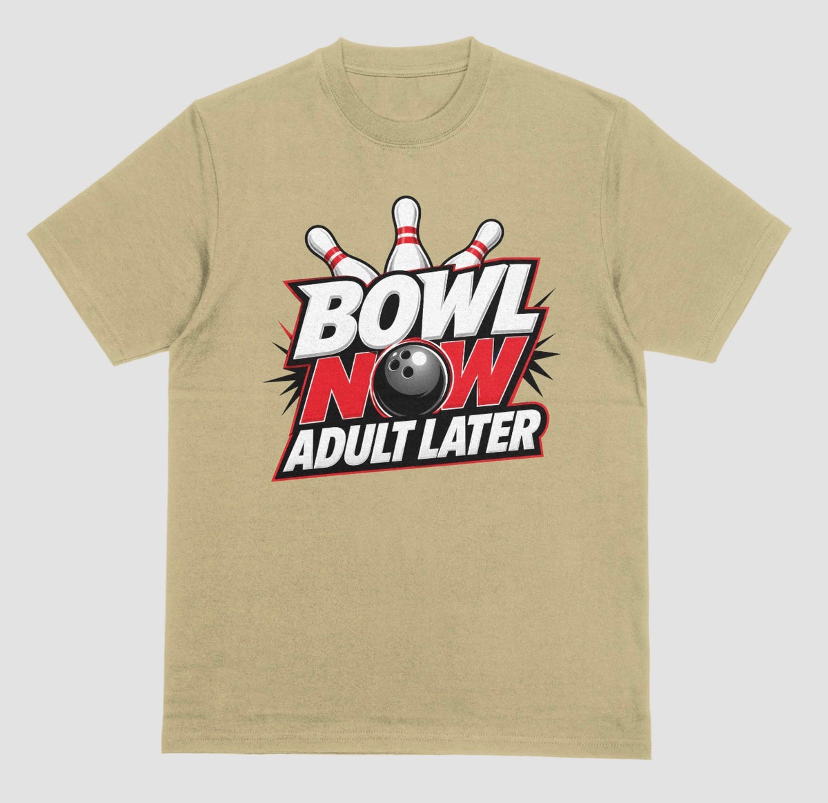 A sand color crewneck t-shirt featuring a bowling-themed graphic on the chest with the text 'BOWL NOW ADULT LATER' and a bowling ball and pins. | Where We Play Apparel