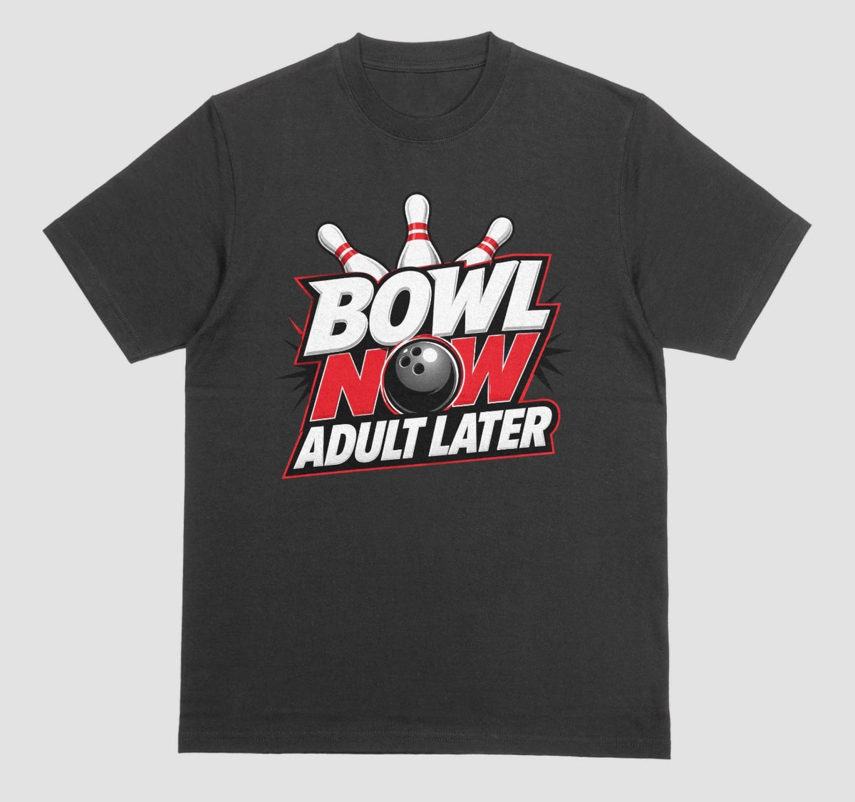 A black crewneck t-shirt featuring a bowling-themed graphic on the chest with the text 'BOWL NOW ADULT LATER' and a bowling ball and pins. | Where We Play Apparel