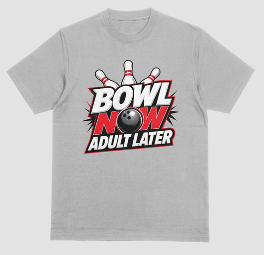 A light gray heather crewneck t-shirt featuring a bowling-themed graphic on the chest with the text 'BOWL NOW ADULT LATER' and a bowling ball and pins. | Where We Play Apparel