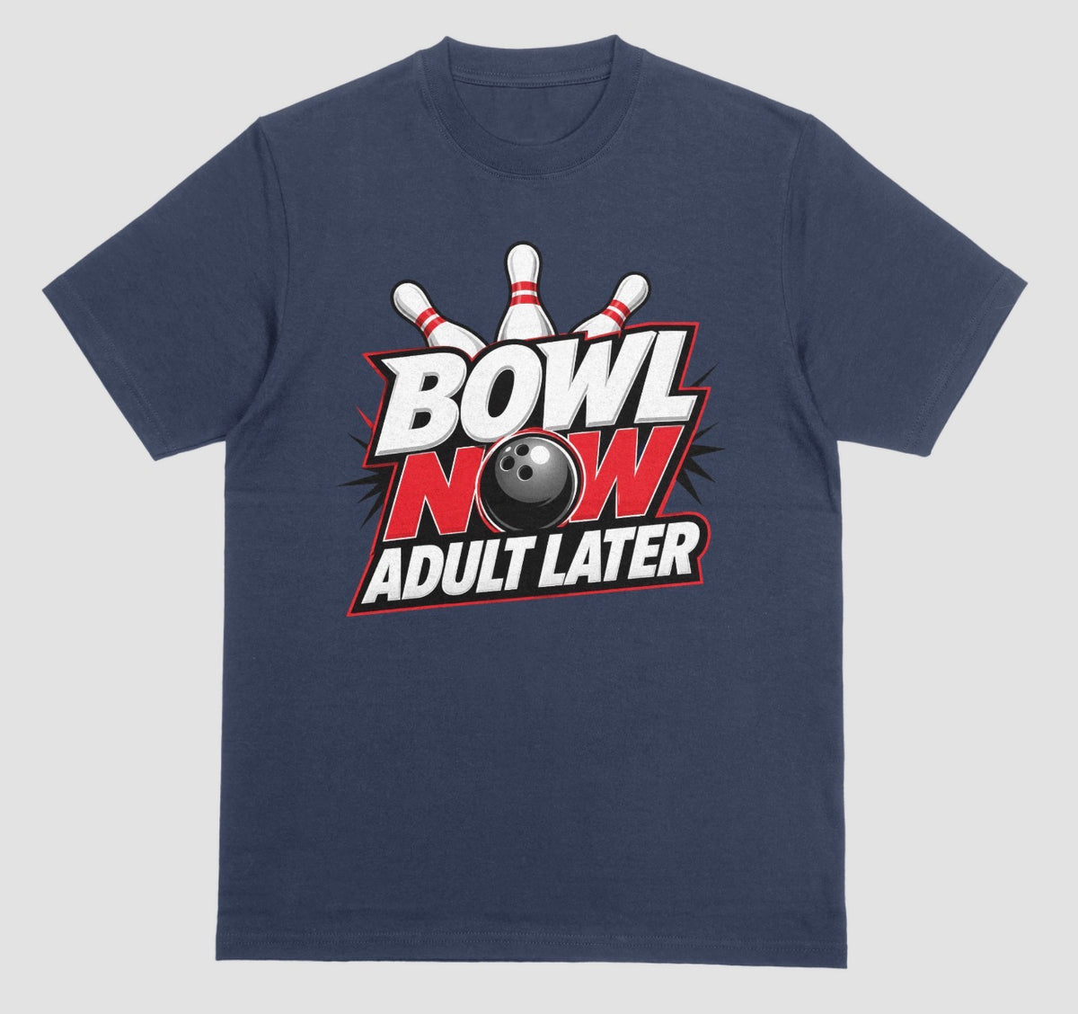 A navy blue crewneck t-shirt featuring a bowling-themed graphic on the chest with the text 'BOWL NOW ADULT LATER' and a bowling ball and pins. | Where We Play Apparel