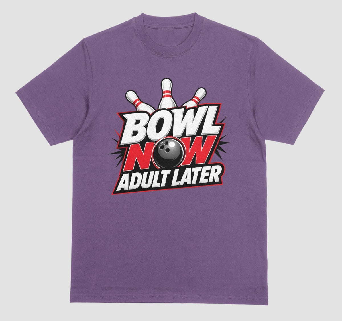 A purple crewneck t-shirt featuring a bowling-themed graphic on the chest with the text 'BOWL NOW ADULT LATER' and a bowling ball and pins. | Where We Play Apparel