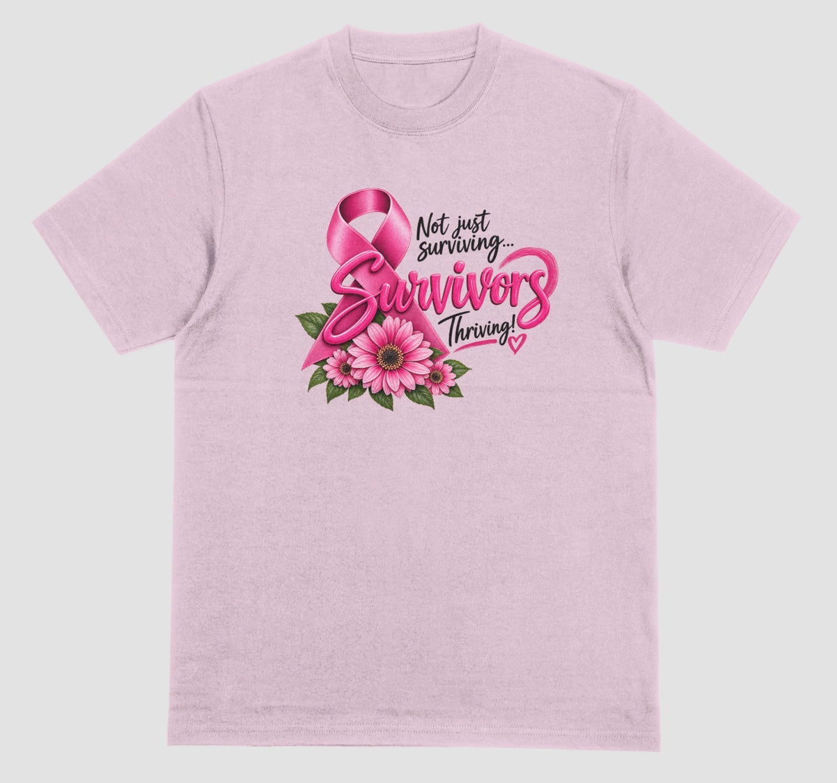 A light pink t-shirt with pink breast cancer awareness ribbon, pink daisy flowers, and 'Not Just Surviving... Survivors Thriving!' quote in pink and black lettering