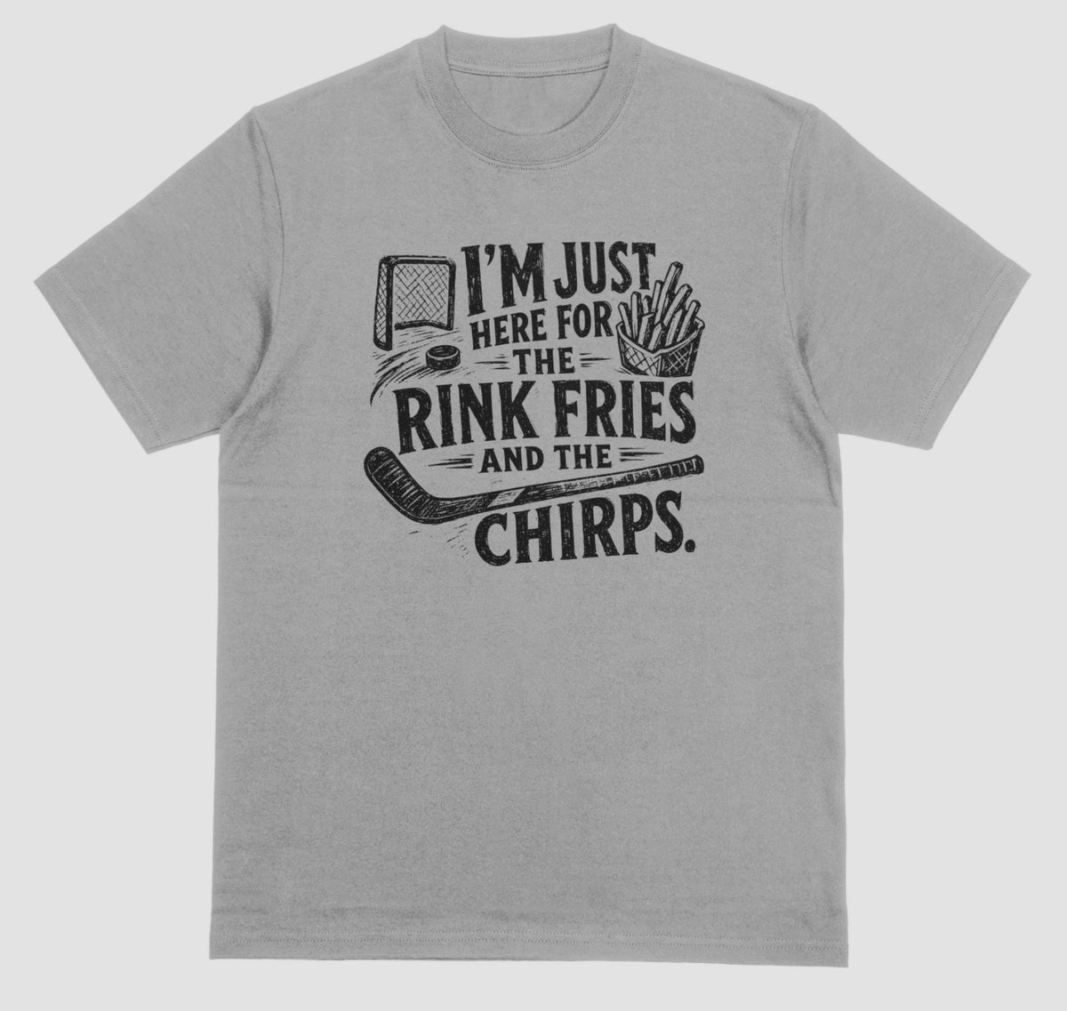A grey t-shirt with black distressed hockey graphic reading “I’m just here for the rink fries and the chirps” with a hockey net, puck, stick, and fries
