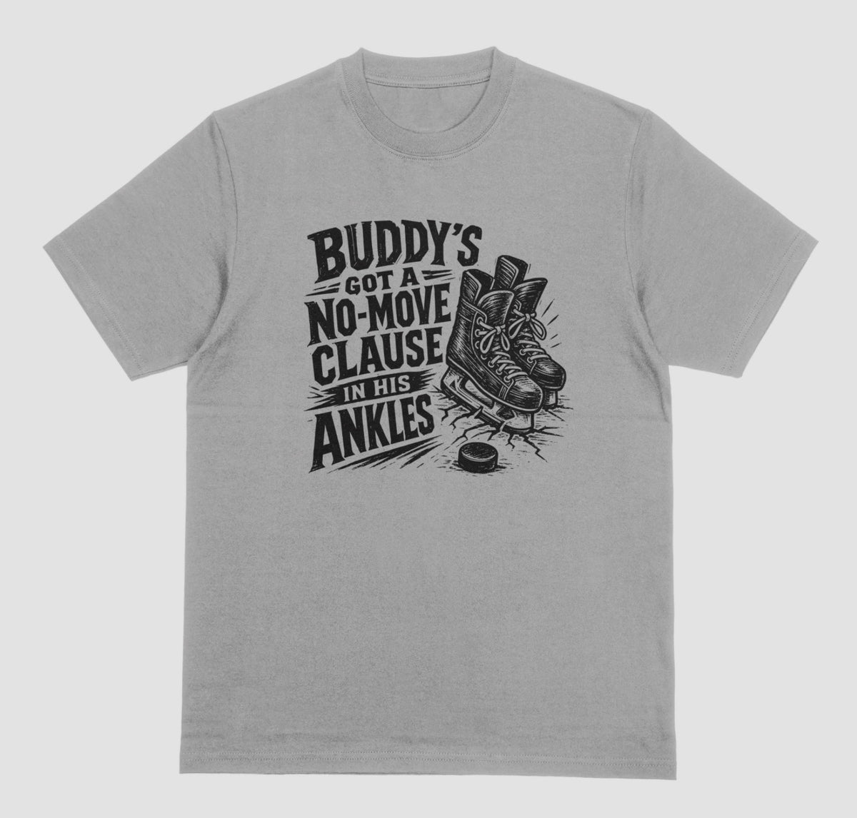 A grey funny hockey t-shirt with black graphic of ice skates and a puck, reading “Buddy’s got a no-move clause in his ankles”