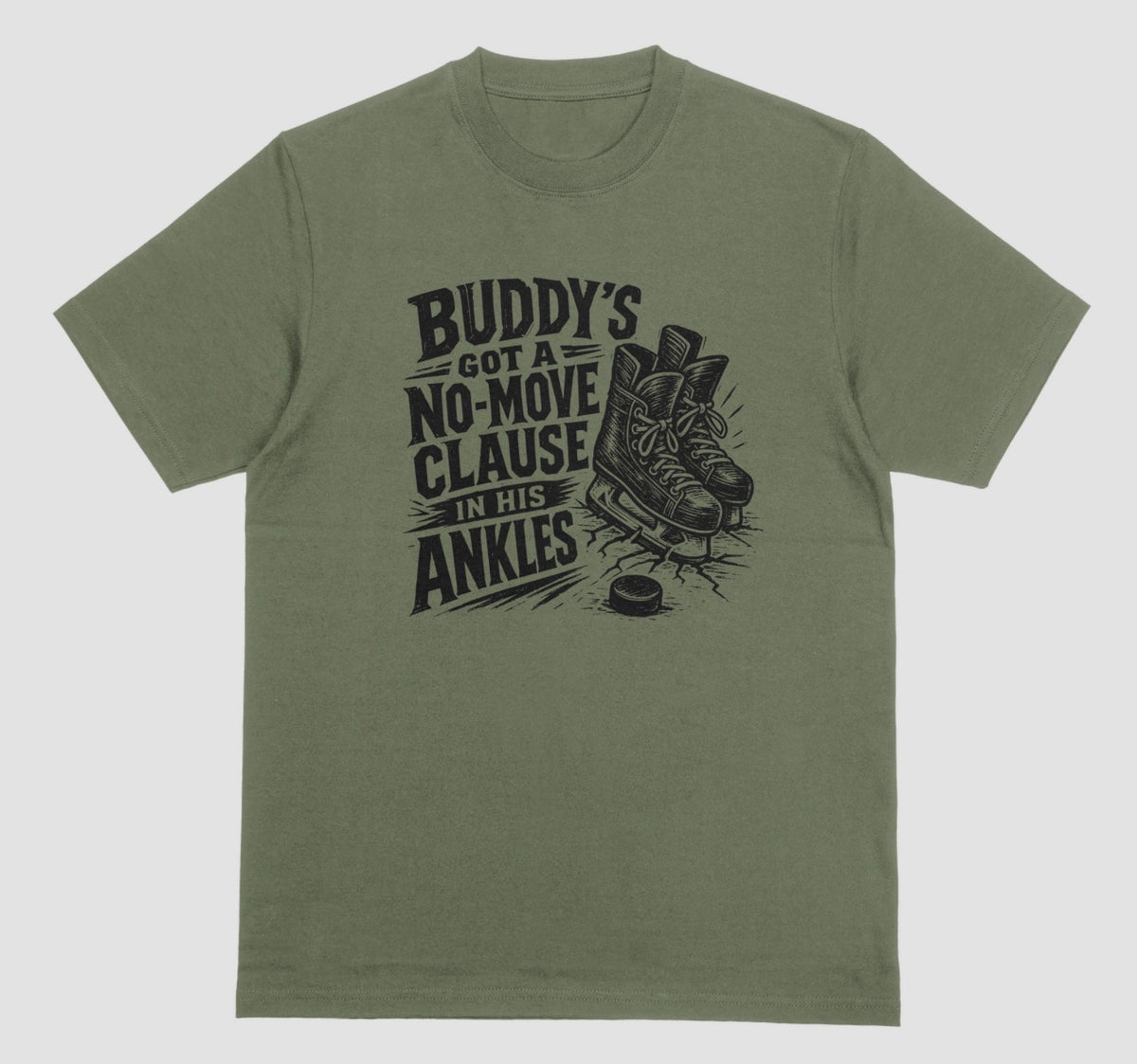 A military green funny hockey t-shirt with black graphic of ice skates and a puck, reading “Buddy’s got a no-move clause in his ankles”