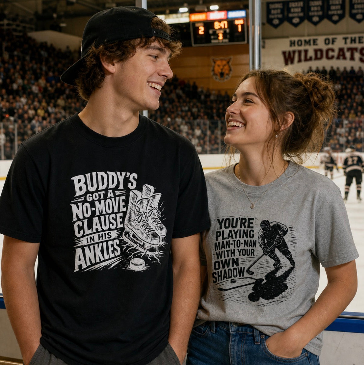 Woman wearing heather gray hockey t-shirt with skater and shadow graphic reading “You’re playing man-to-man with your own shadow,” standing at the rink
