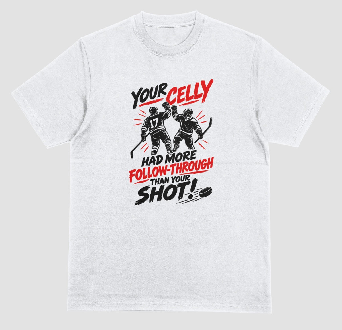 A white hockey t-shirt with red and black graphic of two players celebrating a goal, reading “Your celly had more follow-through than your shot”