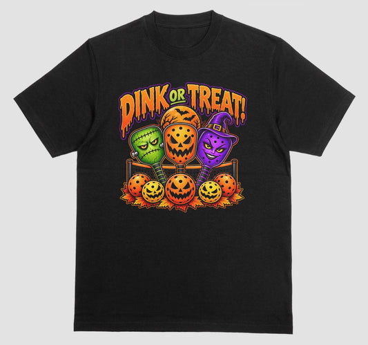 Black “Dink or Treat!” Halloween pickleball t-shirt with Frankenstein, pumpkin, and witch paddles
