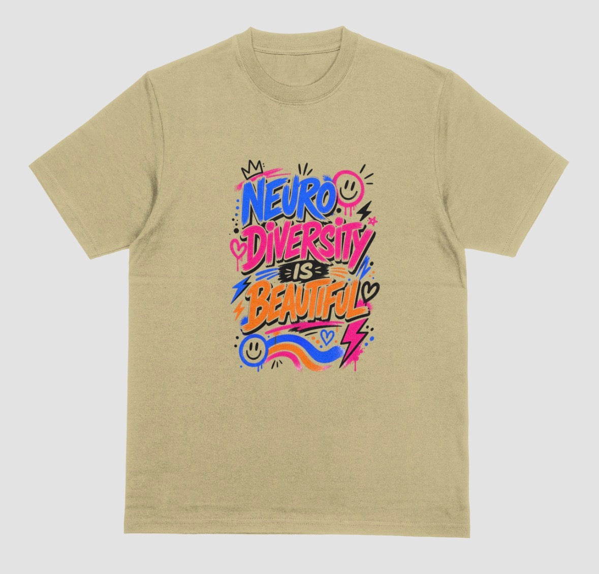 A sand short-sleeve crewneck t-shirt featuring a colorful graphic on the chest that reads 'NEURO DIVERSITY IS BEAUTIFUL' in stylized, graffiti-like lettering with pink, blue, orange, and purple accents.
