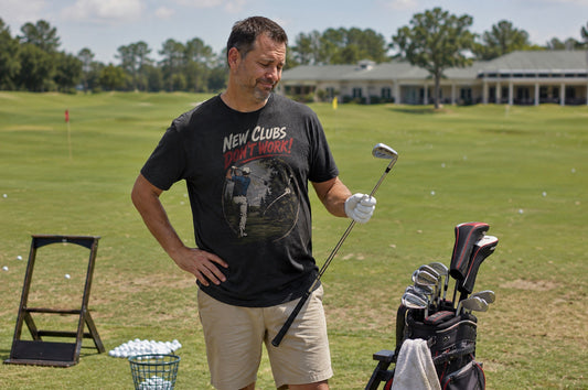 Lifestyle — "Lifestyle photo of New Clubs Don't Work golf shirt worn on the course"