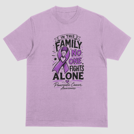 A lilac crewneck t-shirt featuring a graphic design for Pancreatic Cancer Awareness. The design includes a purple ribbon with a heart in the center, surrounded by the text 'IN THIS FAMILY NO ONE FIGHTS ALONE' in black and purple, with 'Pancreatic Cancer Awareness' written at the bottom.