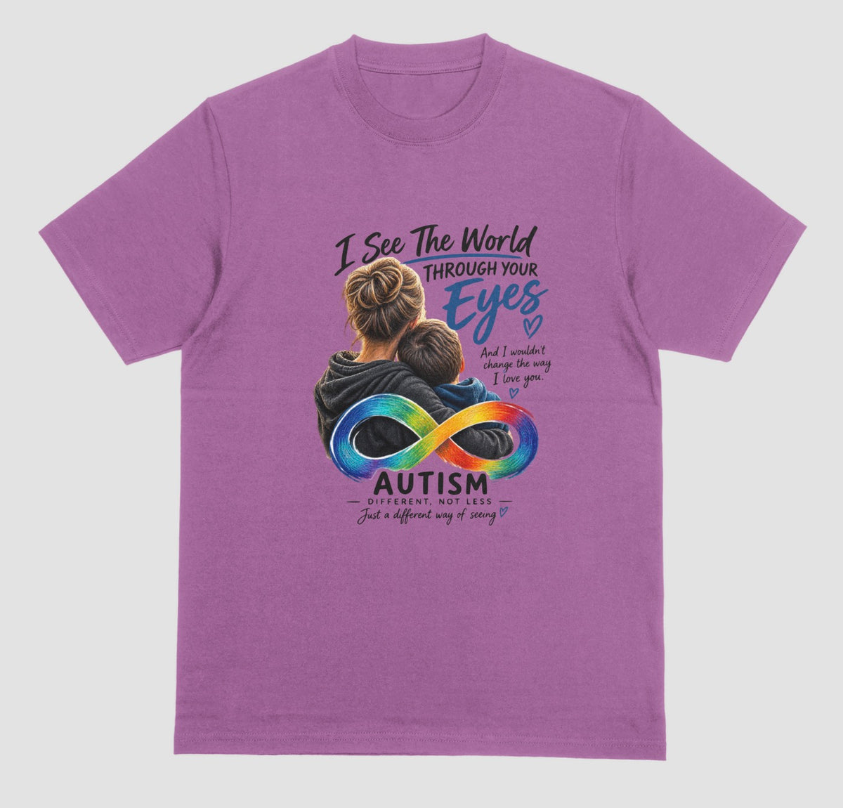 A light orchid t-shirt with a graphic of a parent hugging a child, a rainbow infinity symbol, and the text ‘I See the World Through Your Eyes’ and ‘Autism: Different, Not Less.’