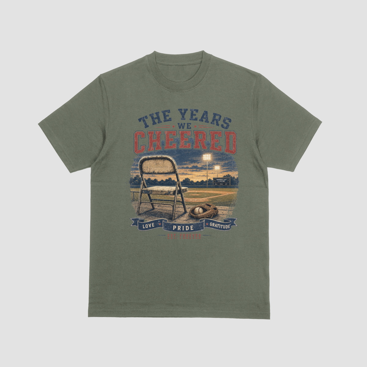 MilGrn — "The Years We Cheered baseball t-shirt in military green featuring a folding chair, baseball glove, and field graphic with Love, Pride, Gratitude banner"